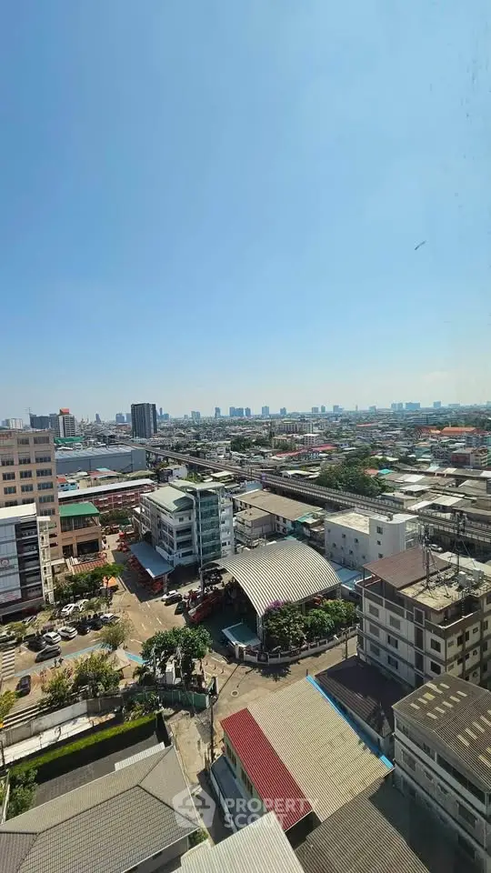 Stunning cityscape view from high-rise building showcasing urban landscape and skyline.