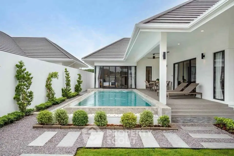 Luxurious modern villa with private pool and stylish outdoor area, perfect for relaxation and entertainment.