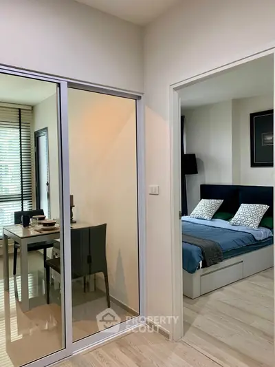 Modern apartment with glass-enclosed study and cozy bedroom