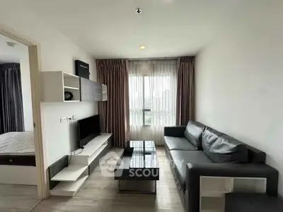 Modern living room with sleek furniture and natural light