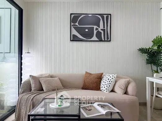 Chic modern living room with cozy beige sofa and stylish decor
