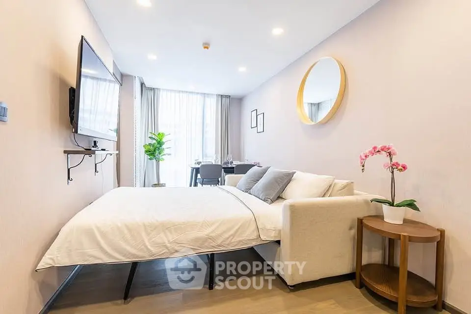 Modern studio apartment with stylish decor and natural light