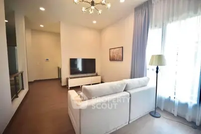 Spacious modern living room with elegant decor and natural light