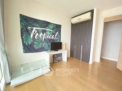 Modern living room with air conditioning and tropical decor