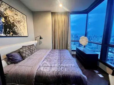 Luxurious bedroom with stunning city view and modern decor