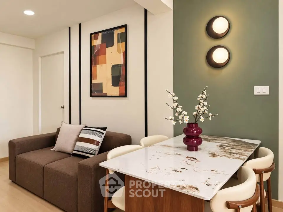 Stylish living room with modern decor and elegant dining area