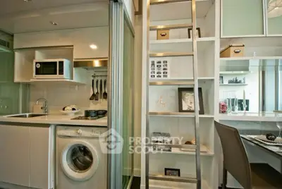 Modern compact kitchen with washing machine and sleek shelving