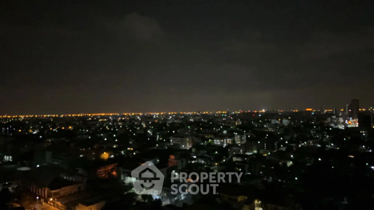 Stunning cityscape night view showcasing vibrant urban lights and skyline.