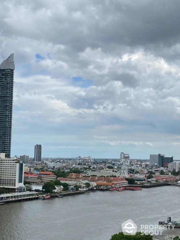 Stunning riverfront cityscape with modern skyscrapers and ferris wheel view