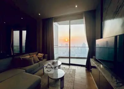 Luxurious living room with stunning city view and modern decor, perfect for urban living.