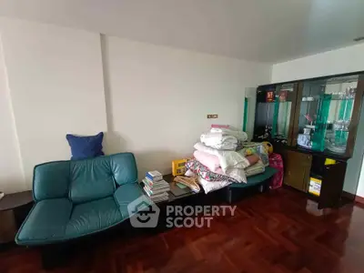 Cozy living room with modern furniture and parquet flooring