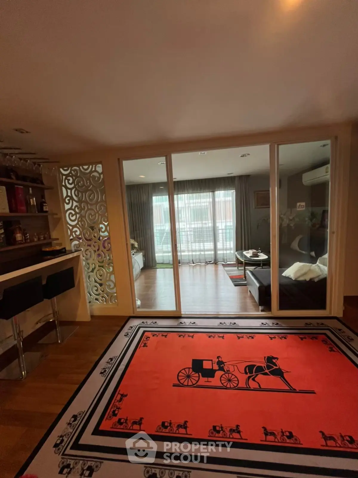 Luxurious living room with elegant decor and stylish bar area