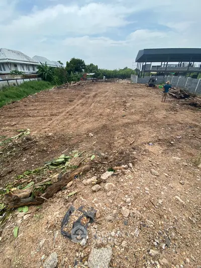 Spacious vacant land ready for development in a serene neighborhood.