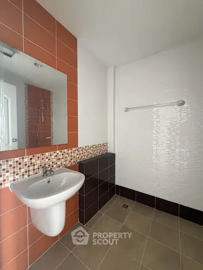 Modern bathroom with stylish tiles and sleek sink design