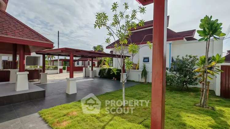 Stunning garden view of modern property with lush greenery and stylish architecture.