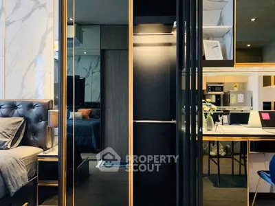 Luxurious modern apartment interior with elegant bedroom and stylish kitchen area.