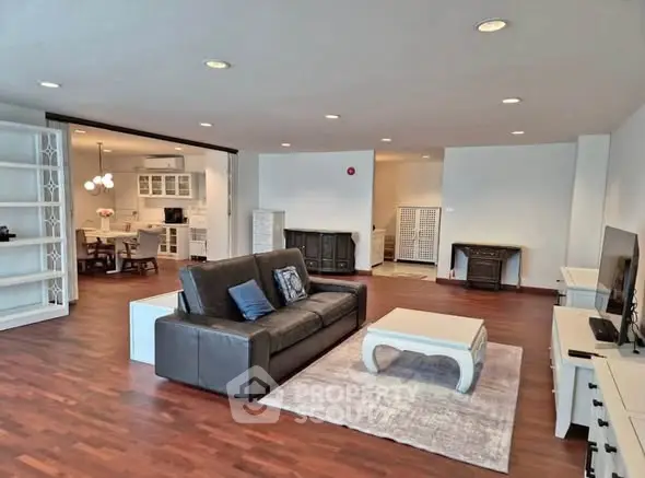 Spacious modern living room with open layout and elegant furnishings