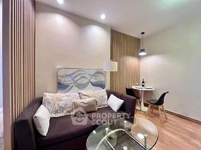 Modern living room with cozy sofa and stylish decor