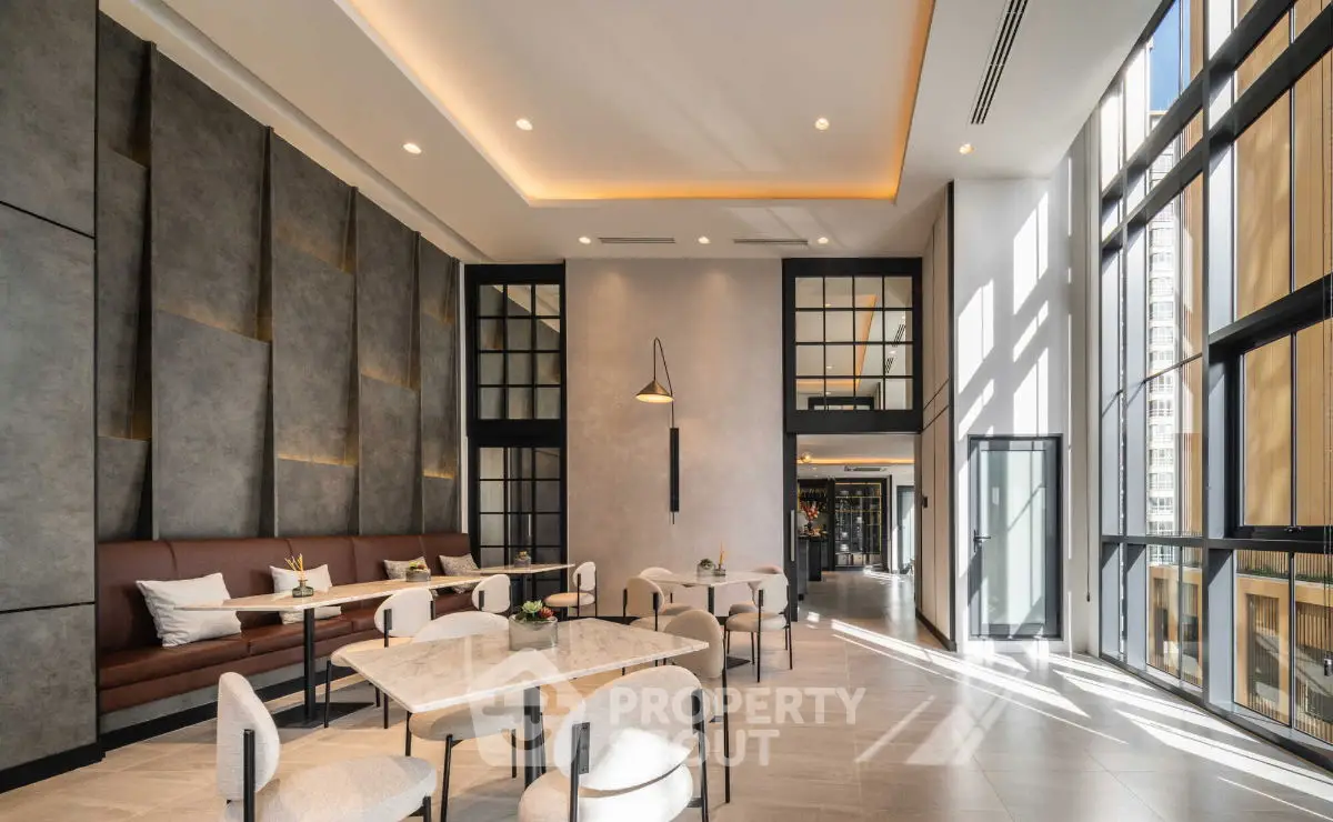 Luxurious modern living room with high ceilings and elegant decor