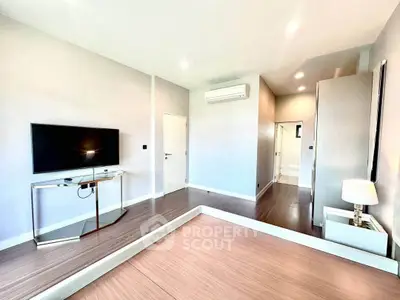 Modern living room with sleek TV setup and stylish decor