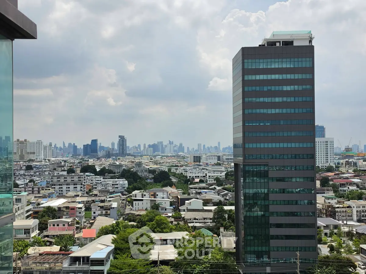 Stunning cityscape view with modern high-rise building and expansive skyline, perfect for urban living enthusiasts.