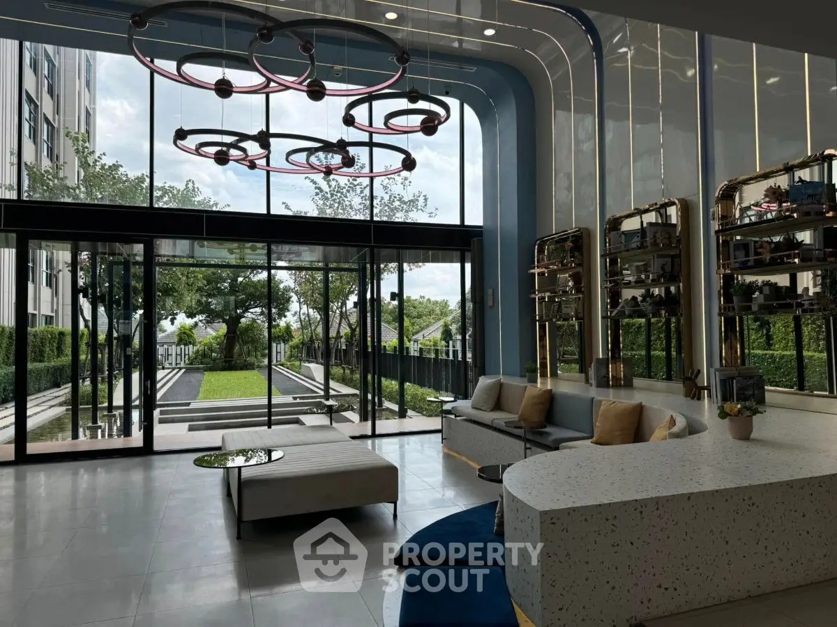 Luxurious modern living room with floor-to-ceiling windows and stylish decor