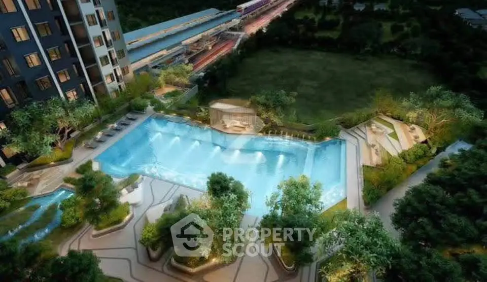 Luxurious residential complex with stunning pool and lush greenery, offering serene urban living.