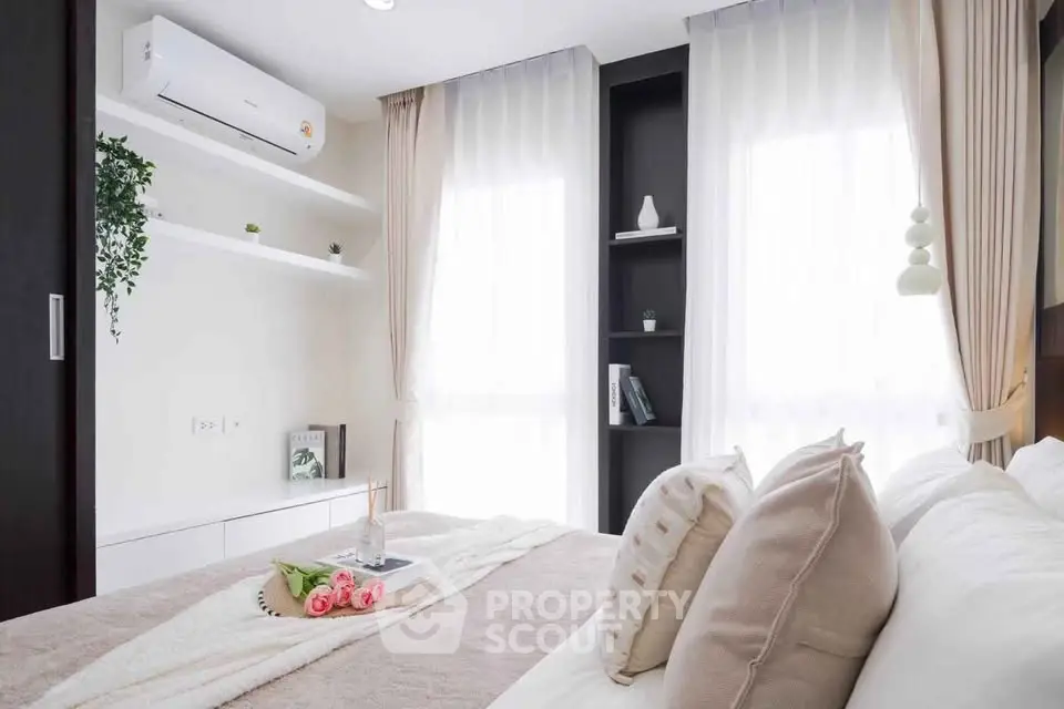 Cozy bedroom with modern decor and natural light