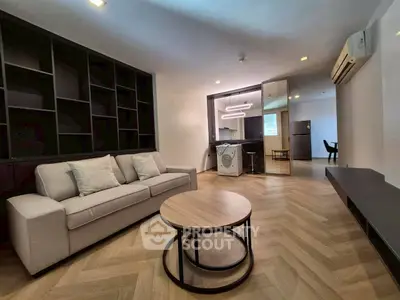 Modern living room with stylish furniture and open layout in a contemporary apartment.