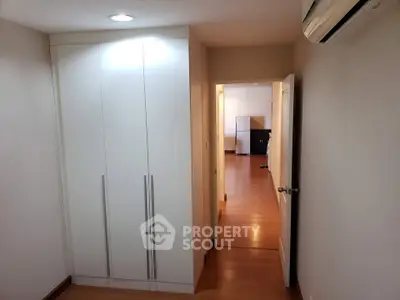 Spacious bedroom with built-in wardrobe and air conditioning