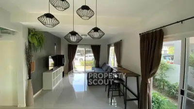 Stylish modern living room with elegant lighting and garden view