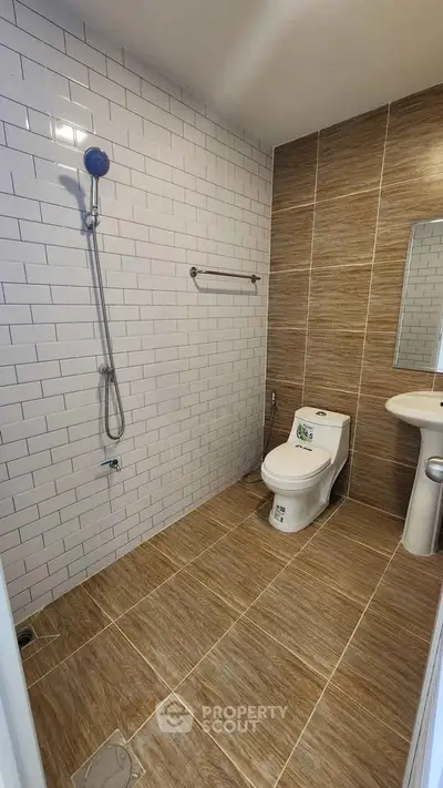 Modern bathroom with sleek tiles and contemporary fixtures