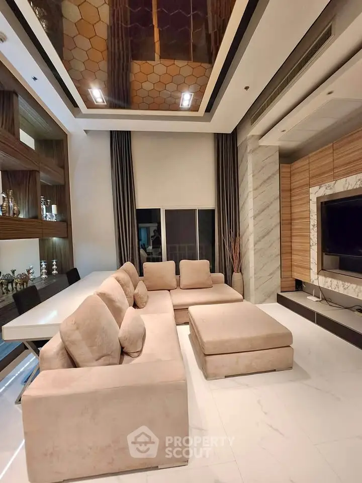 Luxurious modern living room with plush sectional sofa and elegant decor
