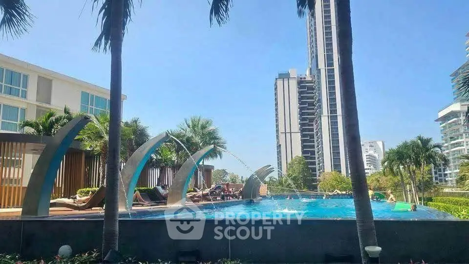 Luxurious rooftop pool with stunning city views and modern architecture, perfect for relaxation and leisure.