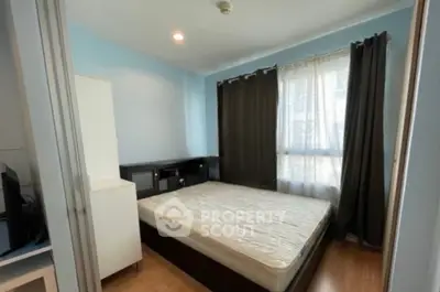 Cozy bedroom with natural light and modern furnishings