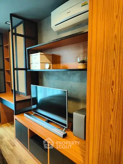 Modern living room with stylish wooden shelves and sleek TV setup