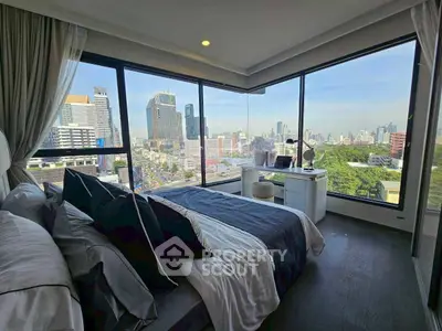 Luxurious bedroom with panoramic city view and modern decor