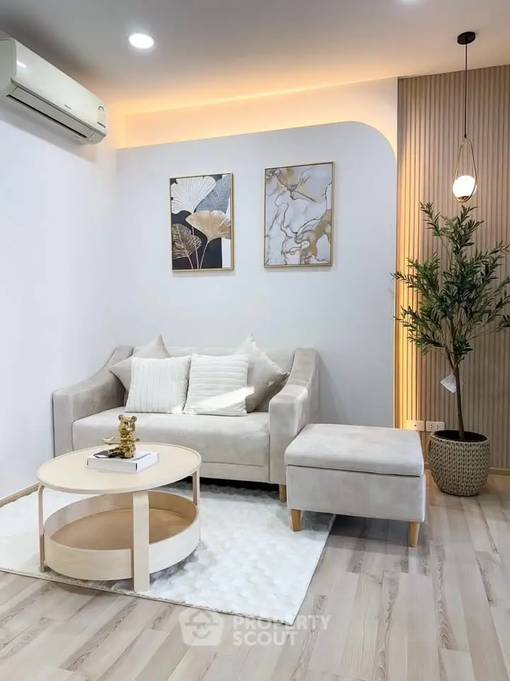 Elegant living room with modern decor and cozy seating area