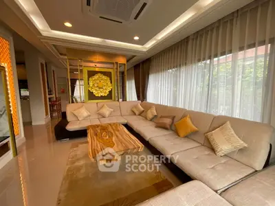 Luxurious living room with elegant decor and large sectional sofa in modern home
