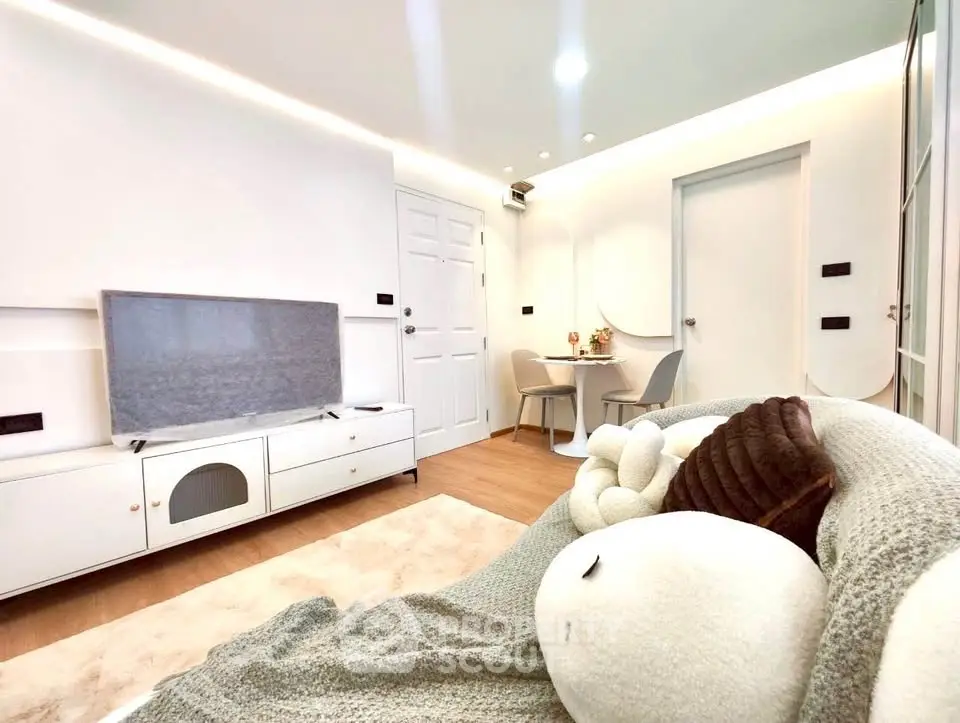 Modern living room with cozy decor and stylish furniture