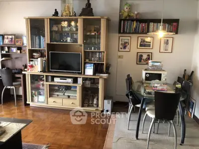 Cozy living room with wooden flooring, modern furniture, and stylish decor.