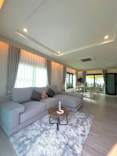 Spacious modern living room with elegant decor and natural light