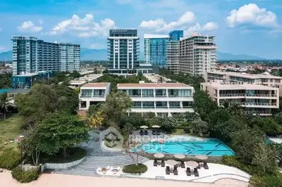 Luxurious beachfront resort with pool and stunning ocean views
