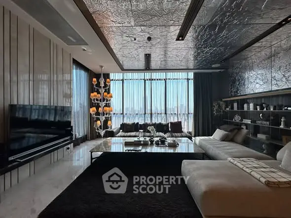 Luxurious living room with modern decor and large windows offering stunning views.