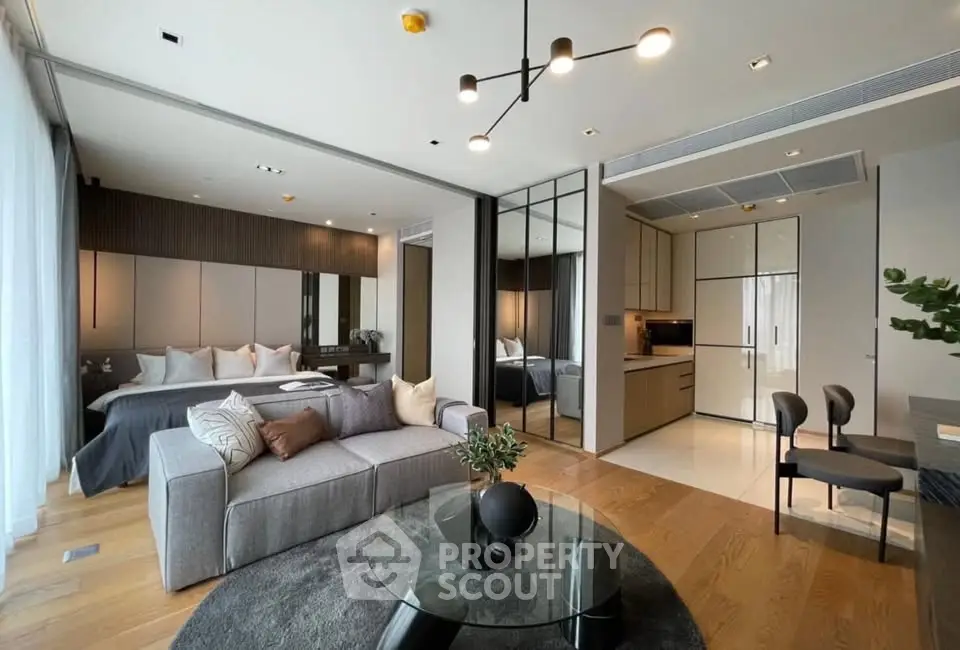Luxurious open-plan living room with modern kitchen and stylish decor