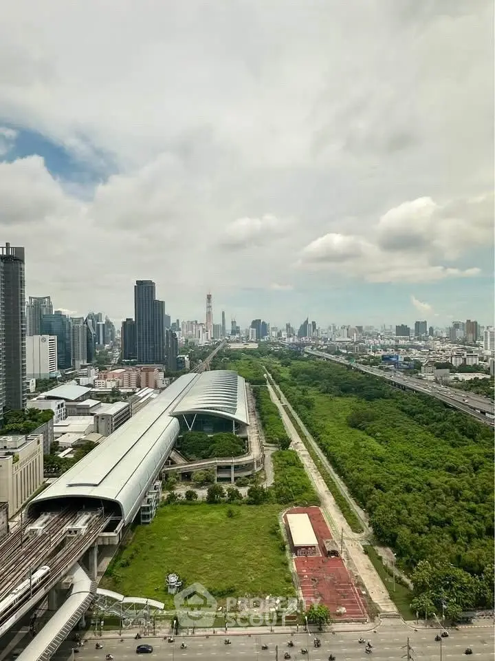 Stunning cityscape view with lush greenery and modern architecture, ideal for urban living enthusiasts.