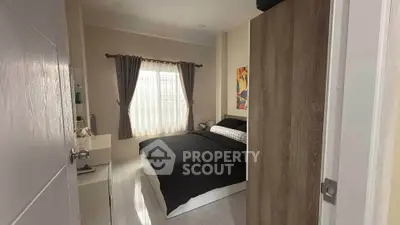 Cozy bedroom with modern decor and natural light