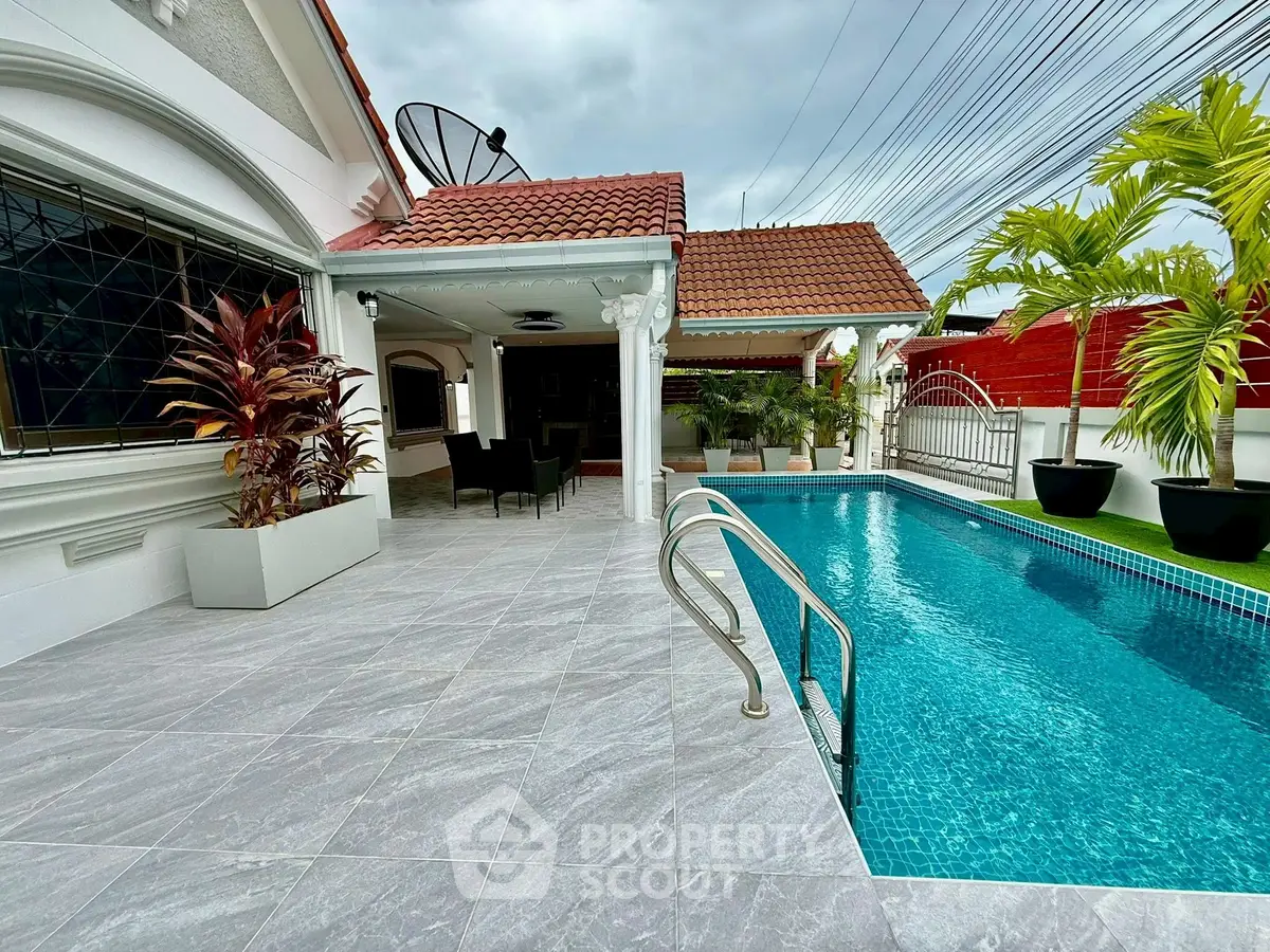 Luxurious villa with private pool and elegant patio, perfect for relaxation and entertainment.