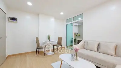 Modern living room with minimalist decor and cozy seating area