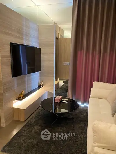 Modern living room with sleek TV setup and elegant decor